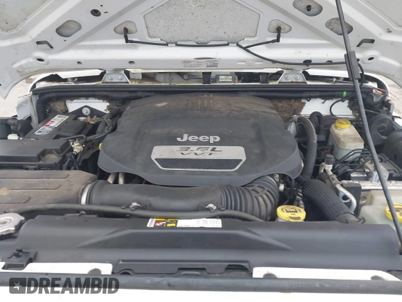 2013 Jeep Wrangler Sport z VIN 1C4AJWAG9DL653348, wystawiony jako IAAI lot #42096860 z przebiegiem 55 575 mil mil oraz . Historia ofert i sprzedaży dostępna na DreamBid. Obrazek 10.