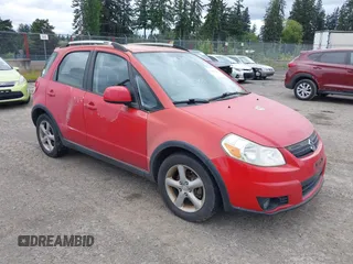 2009 Suzuki SX4 Touring AWD z VIN JS2YB417495101046, wystawiony jako IAAI lot #42196366 z przebiegiem 147 427 mil mil oraz . Historia ofert i sprzedaży dostępna na DreamBid. Obrazek 1.