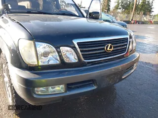 2001 Lexus LX 470 with VIN JTJHT00W613500563, listed as a IAAI auction lot 41730804 with 232,647 mi miles and . Bid and sale history available at carsss.com. Image 6.