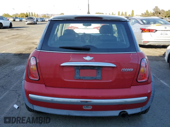 2004 MINI Hardtop with VIN WMWRC33474TJ53569, listed as a Copart auction lot 72429454 with 154,713 mi miles and Salvage Title. Bid and sale history available at DreamBid. Image 6.