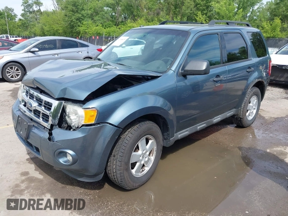 2012 Ford Escape XLT z VIN 1FMCU9DG7CKB91272, wystawiony jako IAAI lot #42168619 z przebiegiem 119 011 mil mil oraz . Historia ofert i sprzedaży dostępna na DreamBid. Obrazek 17.