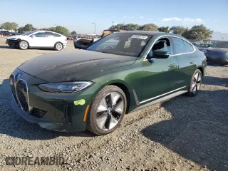 2023 BMW i4 eDrive35 with VIN WBY43AW02PFP52794, listed as a Copart auction lot 83683714 with 21,497 mi miles and Salvage Title. Bid and sale history available at carsss.com. Image 1.