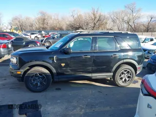 2021 Ford Bronco Sport Badlands z VIN 3FMCR9D92MRB30167, wystawiony jako IAAI lot #41313354 z przebiegiem 53 367 mil mil oraz . Historia ofert i sprzedaży dostępna na DreamBid. Obrazek 14.