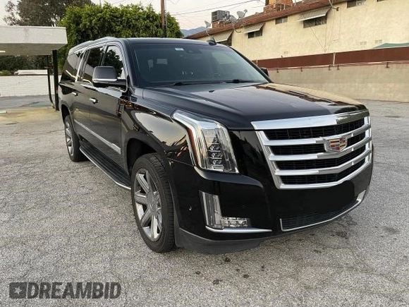 2018 Cadillac Escalade ESV Luxury z VIN 1GYS3HKJ2JR139302, wystawiony jako Copart lot #74639524 z przebiegiem 154 097 mil mil oraz Czysty tytuł • Clean title. Historia ofert i sprzedaży dostępna na DreamBid. Obrazek 1.