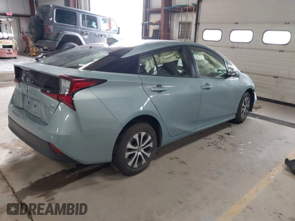 2021 Toyota Prius LE with VIN JTDL9MFU5M3025260, listed as a IAAI auction lot 41374329 with Not provided miles and . Bid and sale history available at DreamBid. Image 4.