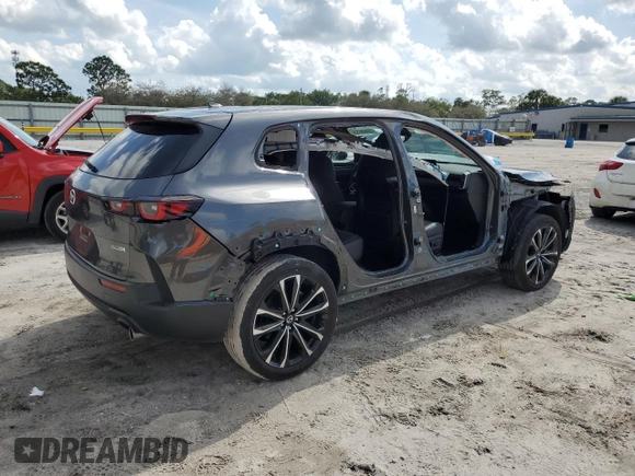 2023 Mazda CX-50 S Premium Plus with VIN 7MMVABEM2PN128862, listed as a Copart auction lot 45869665 with 23,177 mi miles and Salvage Title. Bid and sale history available at DreamBid. Image 3.