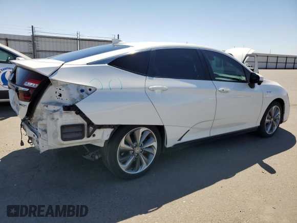 2018 Honda Clarity Plug-In Hybrid with VIN JHMZC5F11JC013897, listed as a Copart auction lot 68315094 with 99,486 mi miles and Salvage Title. Bid and sale history available at carsss.com. Image 3.