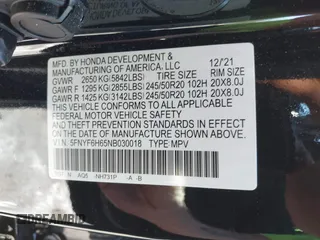 2022 Honda Pilot Touring 7-Passenger with VIN 5FNYF6H65NB030018, listed as a IAAI auction lot 41774147 with 57,391 mi miles. Bid and sale history available at carsss.com. Image 9.