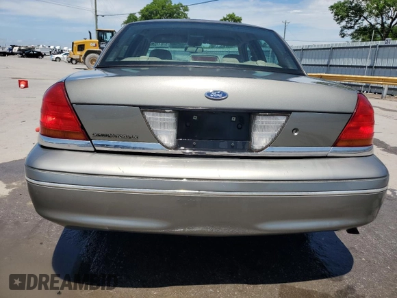 2003 Ford Crown Victoria LX z VIN 2FAFP74W43X123583, wystawiony jako Copart lot #57677555 z przebiegiem 185 336 mil mil oraz Szkoda całkowita • Salvage title. Historia ofert i sprzedaży dostępna na DreamBid. Obrazek 6.