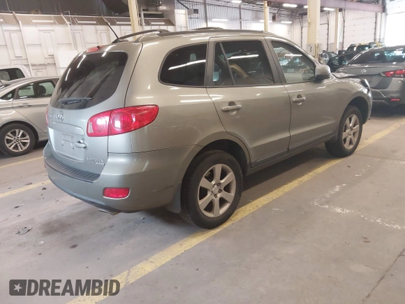 2009 Hyundai Santa Fe SE with VIN 5NMSH73EX9H233513, listed as a IAAI auction lot 42272756 with 155,262 mi miles and . Bid and sale history available at DreamBid. Image 4.