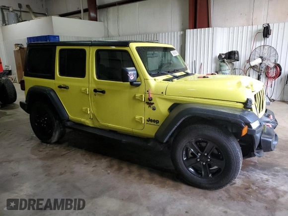 2023 Jeep Wrangler Willys with VIN 1C4HJXDN9PW640617, listed as a Copart auction lot 84894564 with 2,136 mi miles and Salvage Title. Bid and sale history available at DreamBid. Image 4.