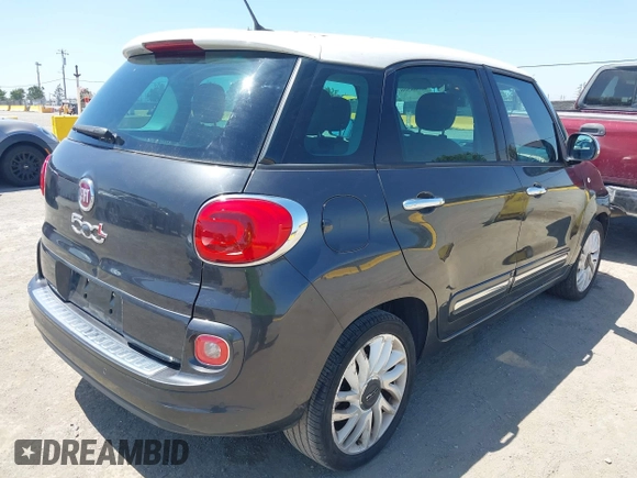 2014 FIAT 500L Lounge with VIN ZFBCFACH9EZ005710, listed as a IAAI auction lot 42508508 with 96,652 mi miles and . Bid and sale history available at DreamBid. Image 4.