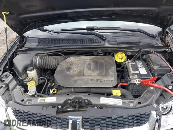 2019 Dodge Grand Caravan SXT with VIN 2C4RDGCG9KR804867, listed as a IAAI auction lot 42032311 with 157,351 mi miles and . Bid and sale history available at DreamBid. Image 10.