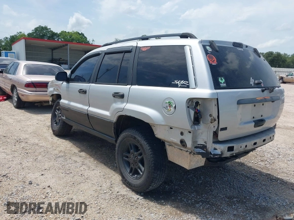 2002 Jeep Grand Cherokee Laredo with VIN 1J4GX48S32C288387, listed as a IAAI auction lot 42212249 with 151,028 mi miles and . Bid and sale history available at DreamBid. Image 3.