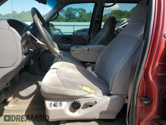 2001 Ford F-150 XLT with VIN 1FTRW07LX1KD65474, listed as a Copart auction lot 61474655 with 361,023 mi miles and Salvage title. Bid and sale history available at DreamBid. Image 7.