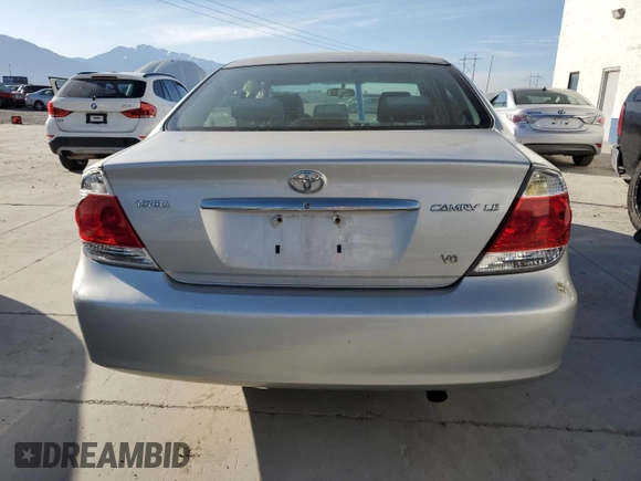 2005 Toyota Camry LE with VIN 4T1BF30K35U104620, listed as a Copart auction lot 53390975 with 146,958 mi miles and Salvage Title. Bid and sale history available at DreamBid. Image 6.