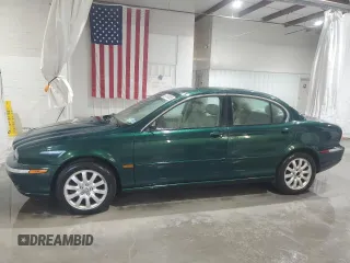 2003 Jaguar X-Type 2.5L Manual z VIN SAJEA51D63XD54591, wystawiony jako Copart lot #57638355 z przebiegiem Nie podano mil oraz Szkody całkowita. Historia ofert i sprzedaży dostępna na DreamBid. Obrazek 1.