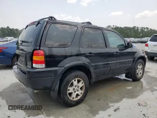 2004 Ford Escape Limited with VIN 1FMCU04164KB51256, listed as a Copart auction lot 58969565 with 137,360 mi miles and Salvage title. Bid and sale history available at DreamBid. Image 3.