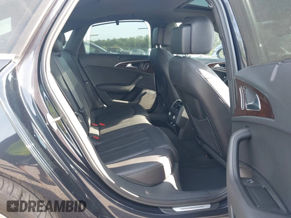 2015 Audi A6 3.0T Prestige with VIN WAUHGAFC3FN011654, listed as a IAAI auction lot 42104153 with 166,719 mi miles. Bid and sale history available at carsss.com. Image 8.
