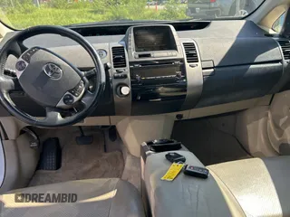 2007 Toyota Prius z VIN JTDKB20U477546822, wystawiony jako Copart lot #61691805 z przebiegiem 146 754 mil mil oraz Czysty tytuł • Clean title. Historia ofert i sprzedaży dostępna na DreamBid. Obrazek 9.