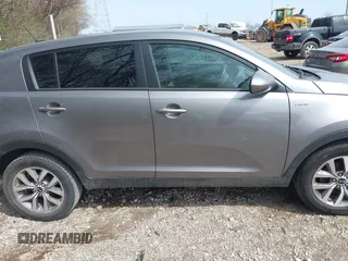 2015 Kia Sportage LX with VIN KNDPBCAC6F7790469, listed as a IAAI auction lot 41942732 with 74,612 mi miles and . Bid and sale history available at DreamBid. Image 13.