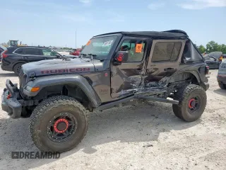 2018 Jeep Wrangler Unlimited Rubicon with VIN 1C4HJXFG6JW166731, listed as a Copart auction lot 56997385 with 117,713 mi miles and Salvage title. Bid and sale history available at DreamBid. Image 1.