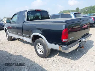 1998 Ford F-150 with VIN 2FTRX18L2WCA30075, listed as a IAAI auction lot 42687836 with 270,580 mi miles and . Bid and sale history available at DreamBid. Image 3.