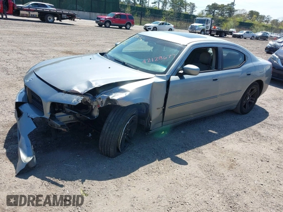 2006 Dodge Charger R/T with VIN 2B3KA53HX6H323577, listed as a IAAI auction lot 42128677 with 268,675 mi miles and . Bid and sale history available at carsss.com. Image 2.
