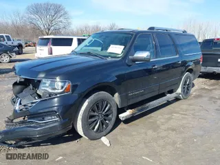 2015 Lincoln Navigator L with VIN 5LMJJ3JT3FEJ00335, listed as a IAAI auction lot 41585554 with 163,841 mi miles. Bid and sale history available at carsss.com. Image 2.