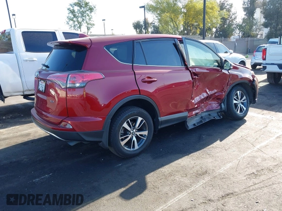 2018 Toyota RAV4 XLE with VIN JTMWFREV6JD117500, listed as a IAAI auction lot 42258588 with Not provided miles and . Bid and sale history available at DreamBid. Image 4.