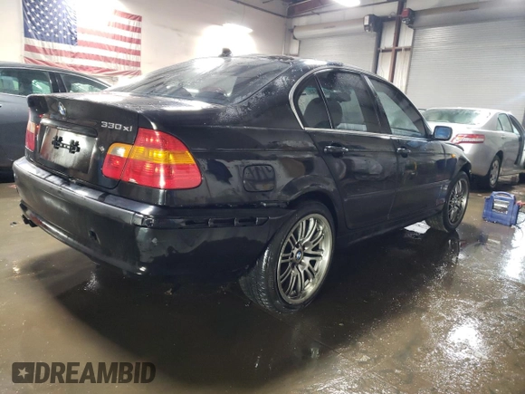 2004 BMW 3 Series 330xi with VIN WBAEW53434PN32952, listed as a Copart auction lot 44027245 with 128,785 mi miles and Salvage Title. Bid and sale history available at carsss.com. Image 3.