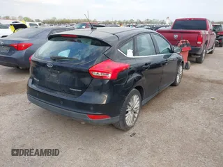 2018 Ford Focus Titanium с VIN 1FADP3N24JL252493, выставлен на аукционе IAAI как лот 41810980 с пробегом 119 998 миль миль и . История ставок и продаж доступна на DreamBid. Изображение 4.