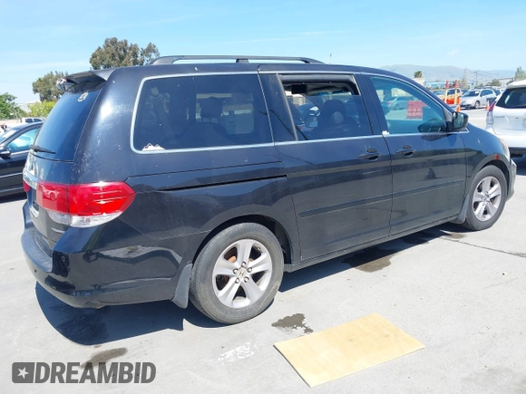 2008 Honda Odyssey Touring with VIN 5FNRL38948B116432, listed as a IAAI auction lot 42162566 with 121,996 mi miles. Bid and sale history available at carsss.com. Image 4.