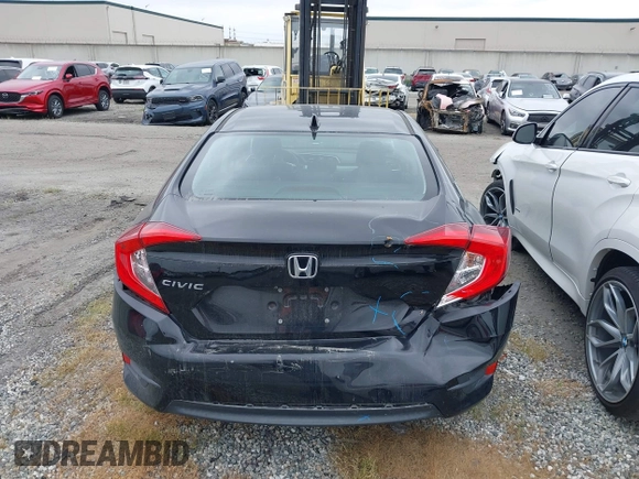2017 Honda Civic EX z VIN 2HGFC2F75HH573907, wystawiony jako IAAI lot #41811813 z przebiegiem 89 937 mil mil oraz . Historia ofert i sprzedaży dostępna na DreamBid. Obrazek 16.