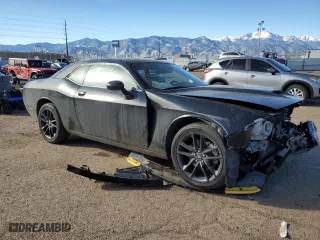 2021 Dodge Challenger GT with VIN 2C3CDZKG3MH677579, listed as a Copart auction lot 41977525 with 65,597 mi miles and Salvage Title. Bid and sale history available at carsss.com. Image 4.