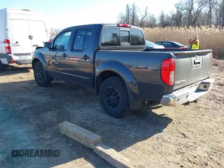 2015 Nissan Frontier Pro-4X with VIN 1N6AD0EV6FN708016, listed as a IAAI auction lot 41660814 with 86,676 mi miles and . Bid and sale history available at DreamBid. Image 3.