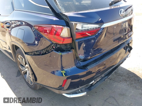 2018 Lexus RX 350L Premium with VIN JTJDZKCA4J2009035, listed as a IAAI auction lot 42636998 with 108,555 mi miles and . Bid and sale history available at DreamBid. Image 6.