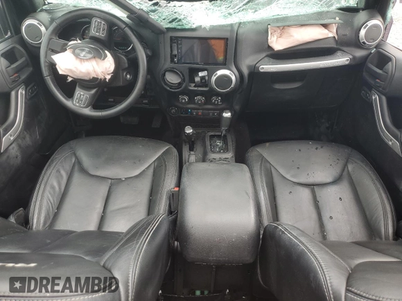2015 Jeep Wrangler Rubicon with VIN 1C4HJWCG0FL755717, listed as a Copart auction lot 61375435 with 153,207 mi miles and Salvage title. Bid and sale history available at DreamBid. Image 8.