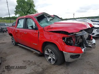 2022 Ram 1500 Laramie with VIN 1C6SRFJT5NN349361, listed as a IAAI auction lot 42342436 with Not provided miles and . Bid and sale history available at DreamBid. Image 1.