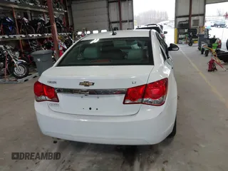 2014 Chevrolet Cruze 1LT with VIN 1G1PC5SB2E7182213, listed as a IAAI auction lot 40787686 with 129,882 mi miles and . Bid and sale history available at DreamBid. Image 16.