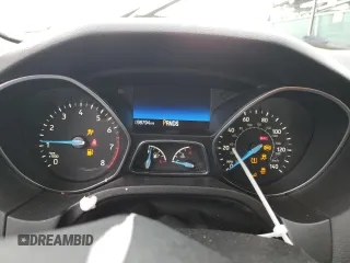 2016 Ford Focus Titanium z VIN 1FADP3N27GL329026, wystawiony jako Copart lot #60910475 z przebiegiem 98 794 mil mil oraz Szkoda całkowita • Salvage title. Historia ofert i sprzedaży dostępna na DreamBid. Obrazek 9.