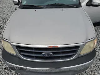 2000 Ford F-150 XL z VIN 2FTRX07L1YCA33404, wystawiony jako Copart lot #51214145 z przebiegiem Nie podano mil oraz Szkoda całkowita • Salvage title. Historia ofert i sprzedaży dostępna na DreamBid. Obrazek 11.
