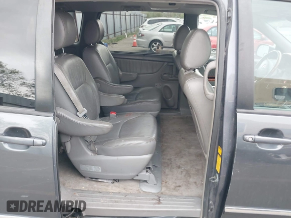 2009 Toyota Sienna XLE with VIN 5TDBK22C19S027059, listed as a IAAI auction lot 42105532 with 241,532 mi miles. Bid and sale history available at carsss.com. Image 8.