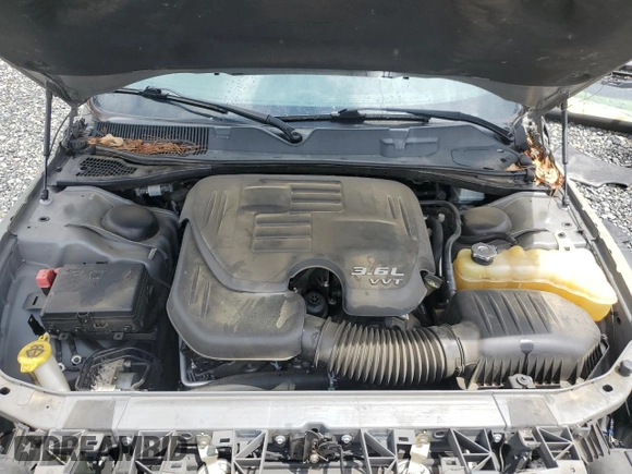 2017 Dodge Challenger SXT z VIN 2C3CDZAG4HH616975, wystawiony jako Copart lot #59321655 z przebiegiem 138 353 mil mil oraz Szkoda całkowita • Salvage title. Historia ofert i sprzedaży dostępna na DreamBid. Obrazek 11.