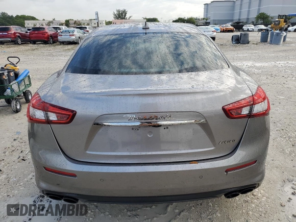 2019 Maserati Ghibli z VIN ZAM57XSA2K1328545, wystawiony jako Copart lot #56291895 z przebiegiem 53 625 mil mil oraz Tytuł czysty. Historia ofert i sprzedaży dostępna na DreamBid. Obrazek 6.