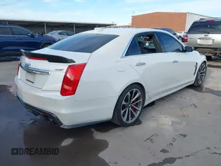 2017 Cadillac CTS-V z VIN 1G6A15S64H0137358, wystawiony jako IAAI lot #41336455 z przebiegiem 76 367 mil mil oraz . Historia ofert i sprzedaży dostępna na DreamBid. Obrazek 4.