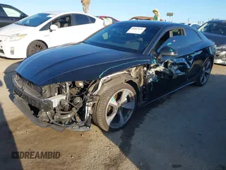 2021 Audi A5 S line Premium Plus z VIN WAUTAAF52MA037616, wystawiony jako IAAI lot #41847476 z przebiegiem 35 401 mil mil oraz . Historia ofert i sprzedaży dostępna na DreamBid. Obrazek 2.