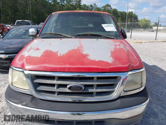 2002 Ford F-150 XL with VIN 1FTRX17W12NA07936, listed as a IAAI auction lot 42068598 with 1 mi miles. Bid and sale history available at carsss.com. Image 6.
