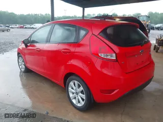 2012 Ford Fiesta SE with VIN 3FADP4EJ4CM215670, listed as a IAAI auction lot 41980900 with 87,874 mi miles. Bid and sale history available at carsss.com. Image 3.