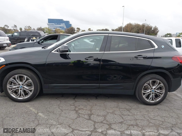 2020 BMW X2 sDrive28i with VIN WBXYH9C08L5R62746, listed as a IAAI auction lot 41788571 with 20,981 mi miles. Bid and sale history available at carsss.com. Image 14.